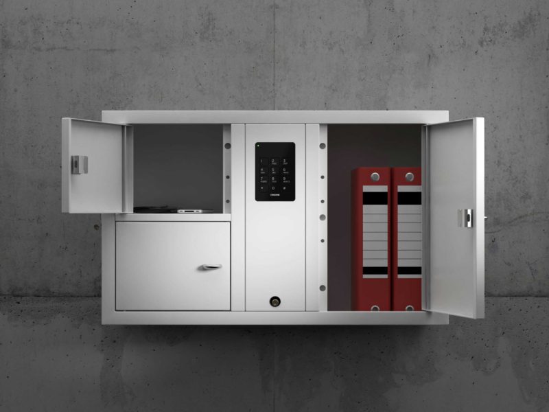 Wertschrank 7003 S der Serie System. Wandmontage mit offenen Fächern mit Ordnern, Telefon und Brieftasche.