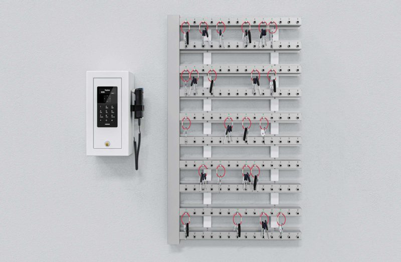 Intelligent key strips with control box mounted on the wall for key management.